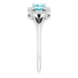 Oval Blue Zircon & Diamond Three Stone Ring in Gold and Platinum