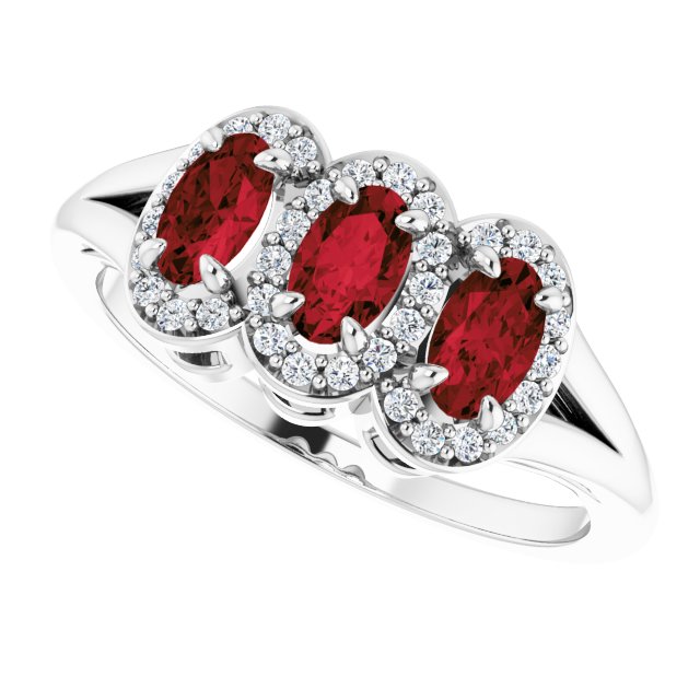 Oval Mozambique Garnet & Diamond Ring in Gold and Platinum