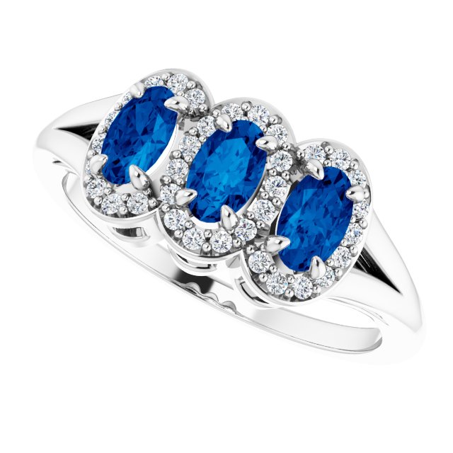 Oval Blue Sapphire & Diamond Three Stone Ring in Gold and Platinum