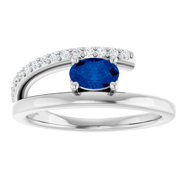 Oval Blue Sapphire & Diamond Accented Ring in Gold and Platinum