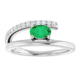 Oval Emerald & Diamond Accented Ring in Gold and Platinum