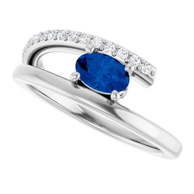 Oval Blue Sapphire & Diamond Accented Ring in Gold and Platinum