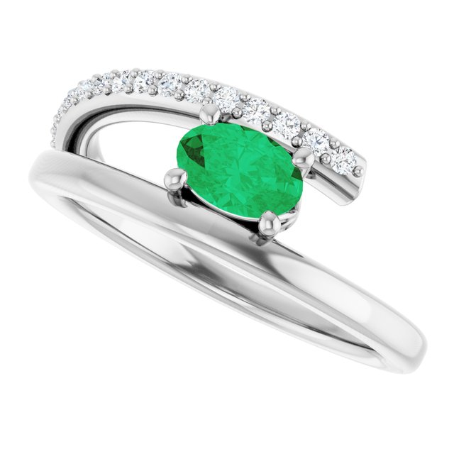 Oval Emerald & Diamond Accented Ring in Gold and Platinum