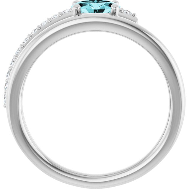 Oval Blue Zircon & Diamond Accented Ring in Gold and Platinum