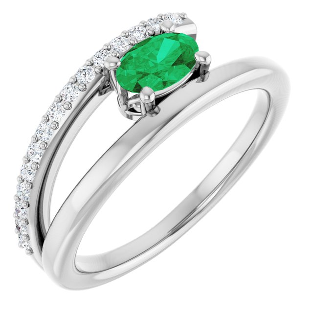 Oval Emerald & Diamond Accented Ring in Gold and Platinum