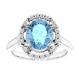 Oval Aquamarine Halo Ring with Diamond Accents in Gold and Platinum