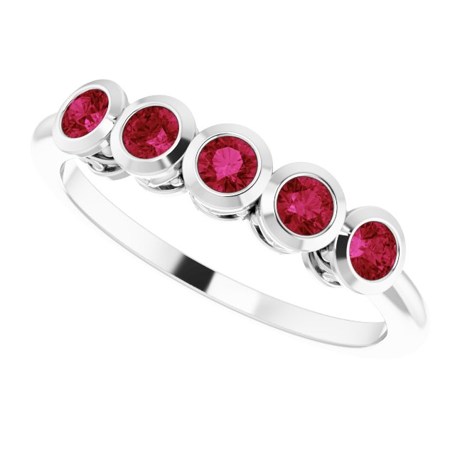 Round Ruby Accented Ring in Gold and Platinum