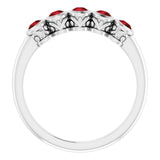 Round Mozambique Garnet Accented Ring in Gold and Platinum