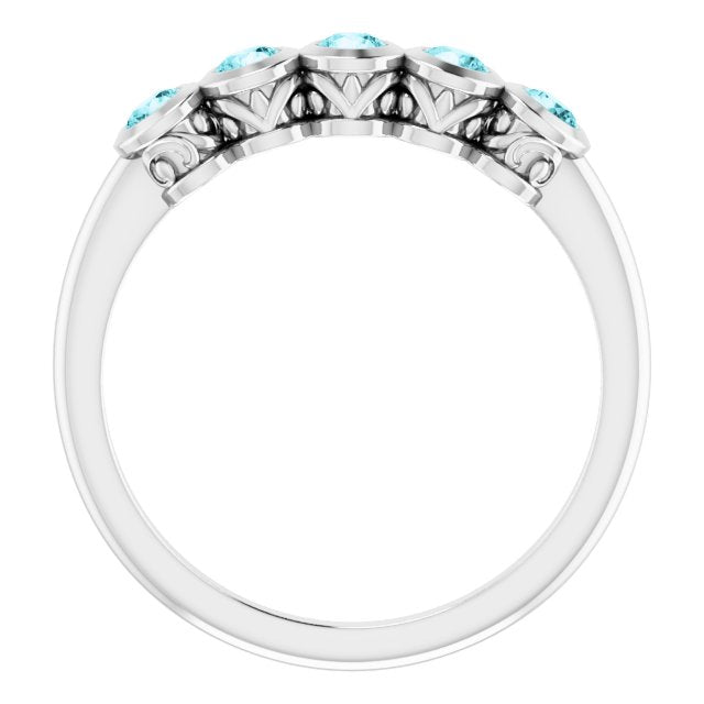 Round Blue Zircon Accented Ring in Gold and Platinum