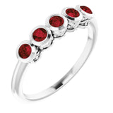 Round Mozambique Garnet Accented Ring in Gold and Platinum