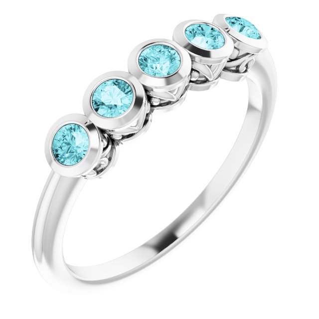 Round Blue Zircon Accented Ring in Gold and Platinum