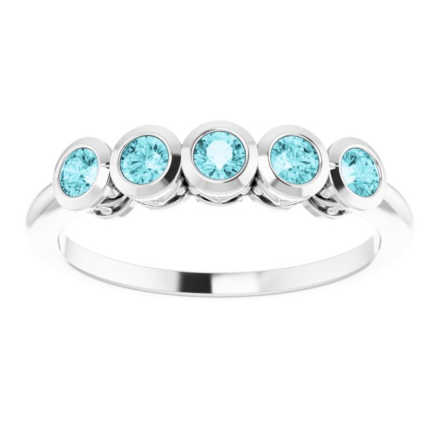 Round Blue Zircon Accented Ring in Gold and Platinum