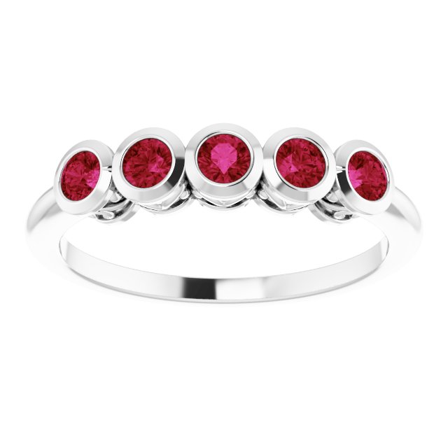 Round Ruby Accented Ring in Gold and Platinum