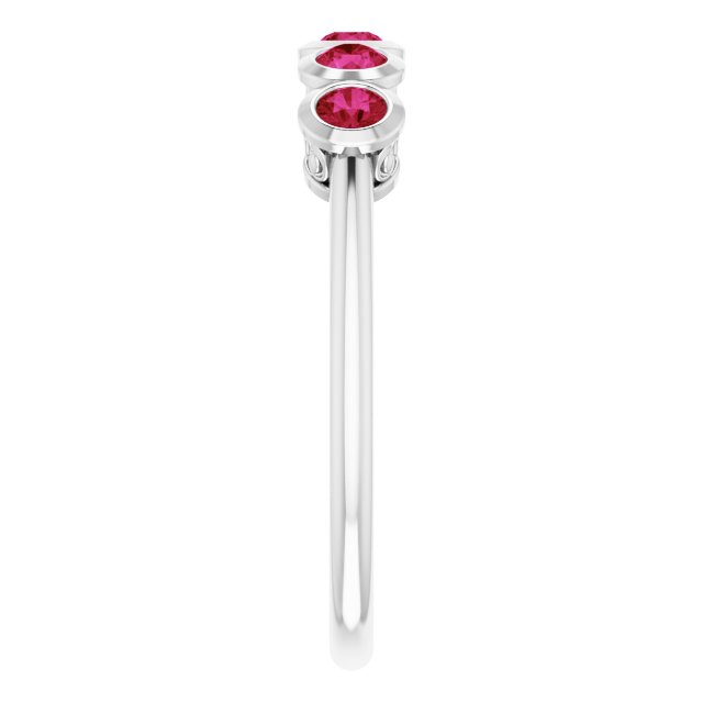 Round Ruby Accented Ring in Gold and Platinum