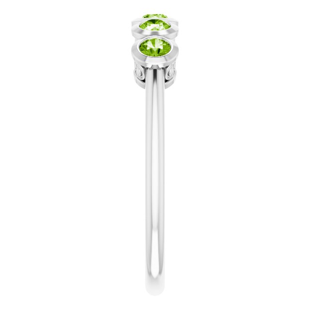 Round Peridot Accented Ring in Gold and Platinum