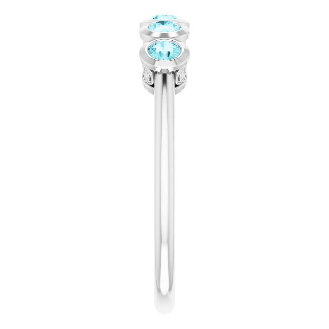 Round Blue Zircon Accented Ring in Gold and Platinum