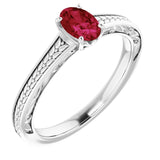 Oval Lab-Grown Ruby Solitaire Ring in Gold and Platinum