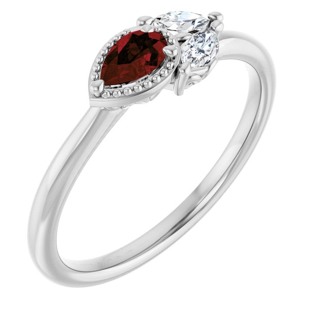 Pear Mozambique Garnet & Diamond Accented Ring in Gold and Platinum