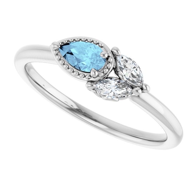 Pear Aquamarine & Diamond Accented Ring in Gold and Platinum