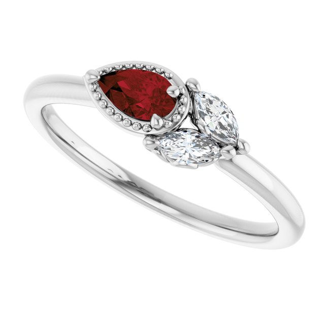 Pear Mozambique Garnet & Diamond Accented Ring in Gold and Platinum