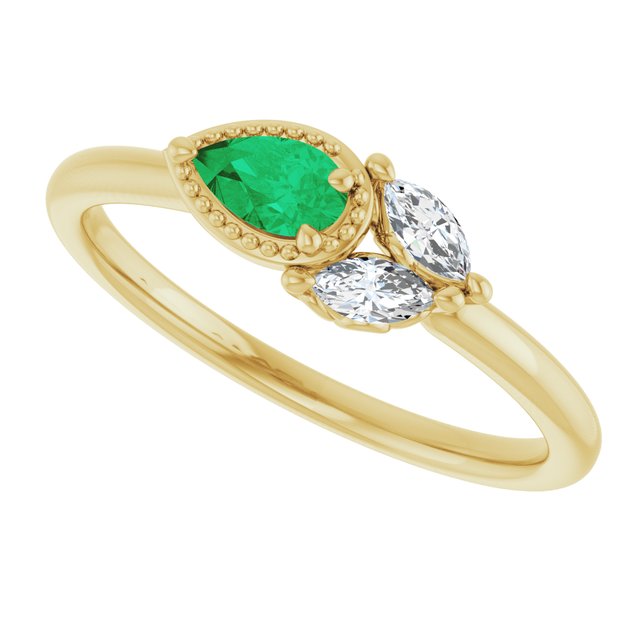 Pear Emerald & Diamond Accented Ring in Gold and Platinum