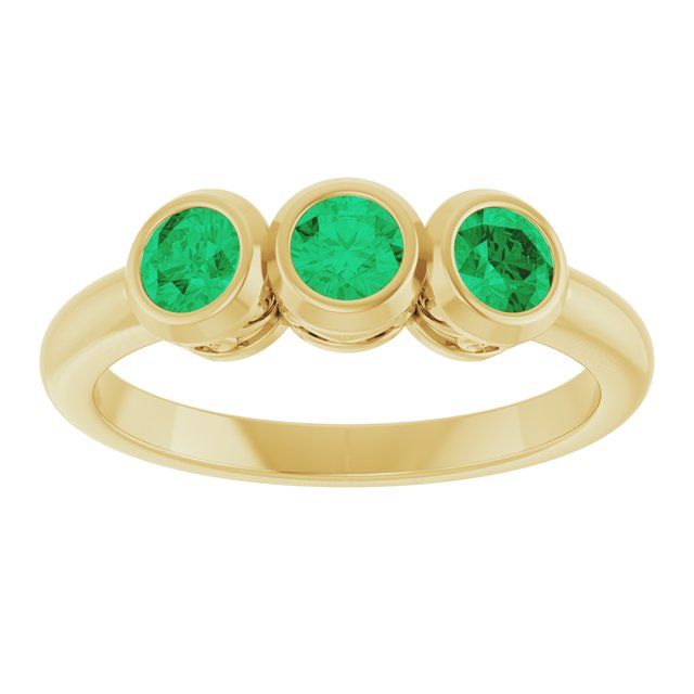 Round Emerald Three Stone Ring in Yellow Gold