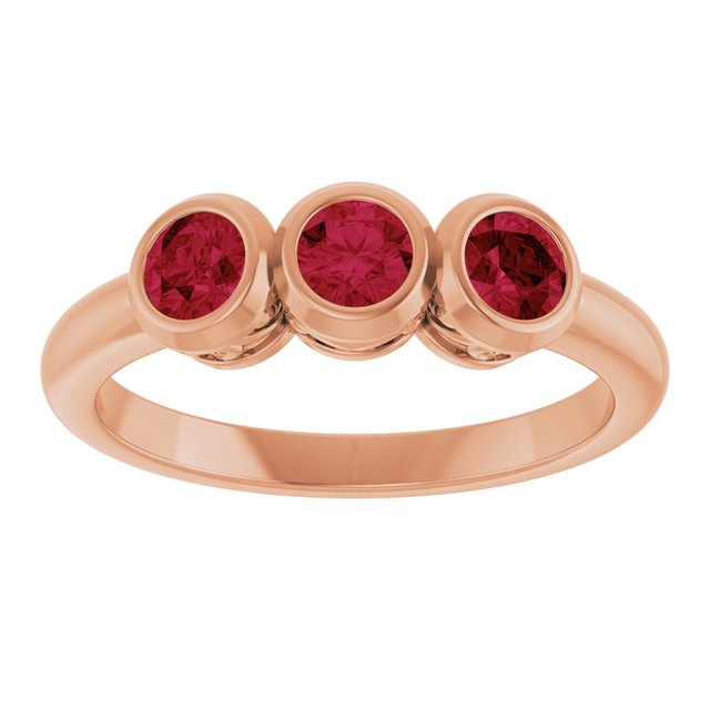Round Ruby Three Stone Ring in Gold