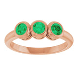 Round Lab-Grown Emerald Three Stone Ring in Rose Gold