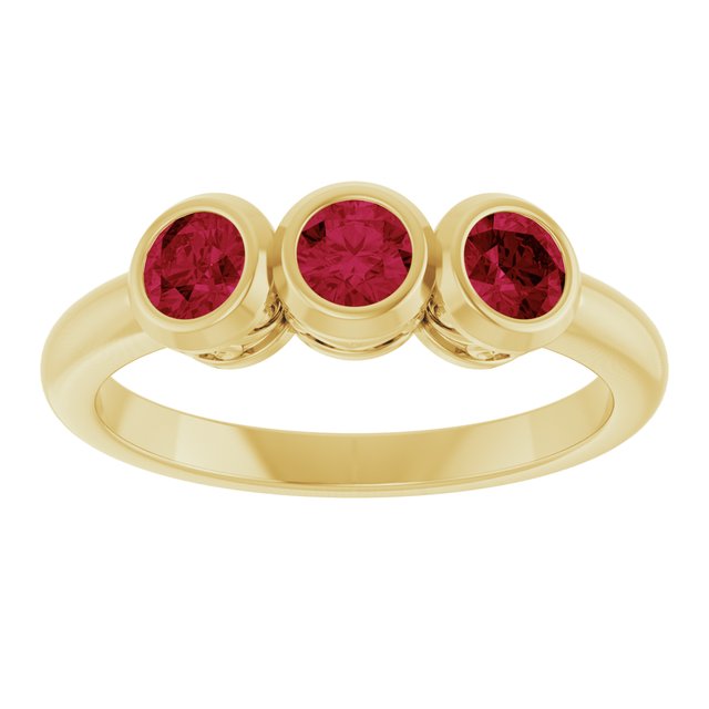 Round Lab-Grown Ruby Three Stone Ring in Yellow Gold