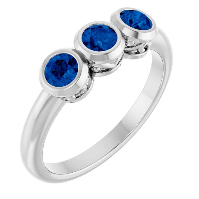 Round Lab-Grown Blue Sapphire Three Stone Ring in White Gold