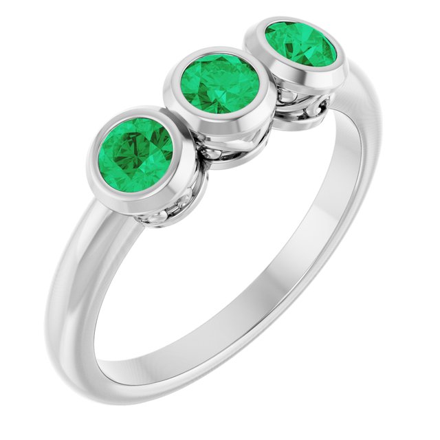 Round Emerald Three Stone Ring in White Gold