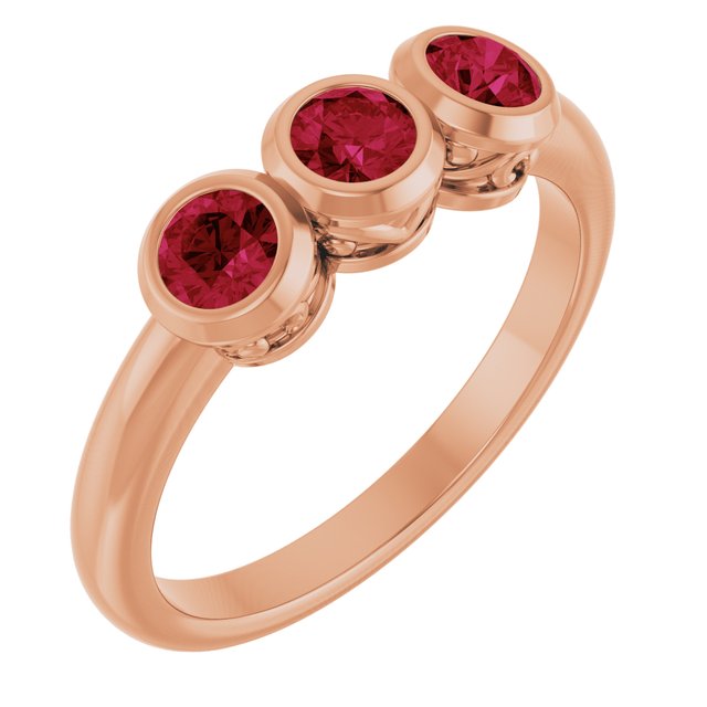 Round Lab-Grown Ruby Three Stone Ring in Rose Gold