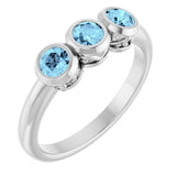 Round Aquamarine Three Stone Ring in White Gold