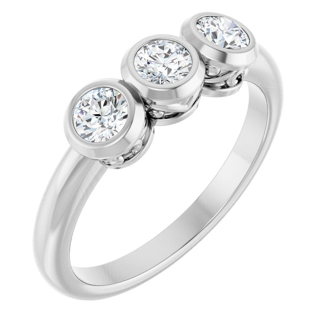 Round White Sapphire Three Stone Ring in Platinum