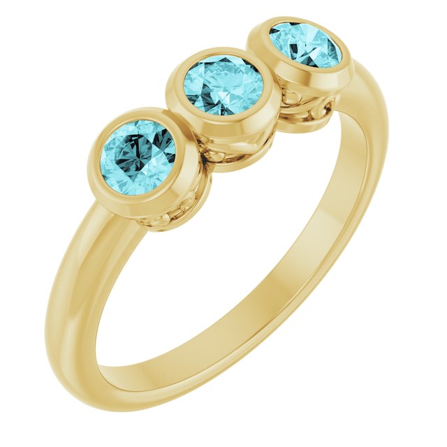 Round Blue Zircon Three Stone Ring in Yellow Gold