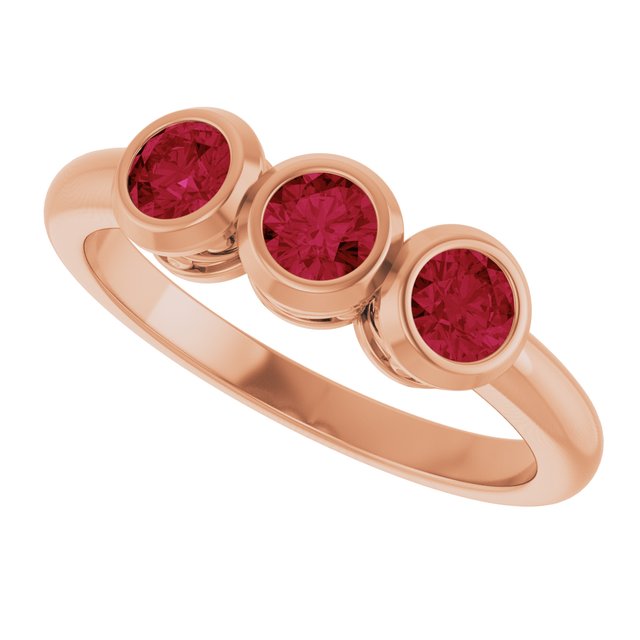 Round Ruby Three Stone Ring in Gold