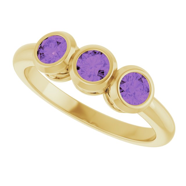 Round Amethyst Three Stone Ring in Yellow Gold