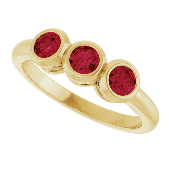Round Lab-Grown Ruby Three Stone Ring in Yellow Gold