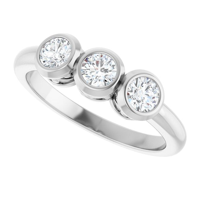 Round White Sapphire Three Stone Ring in White Gold