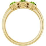 Round Peridot Three Stone Ring in Yellow Gold