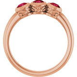 Round Ruby Three Stone Ring in Gold