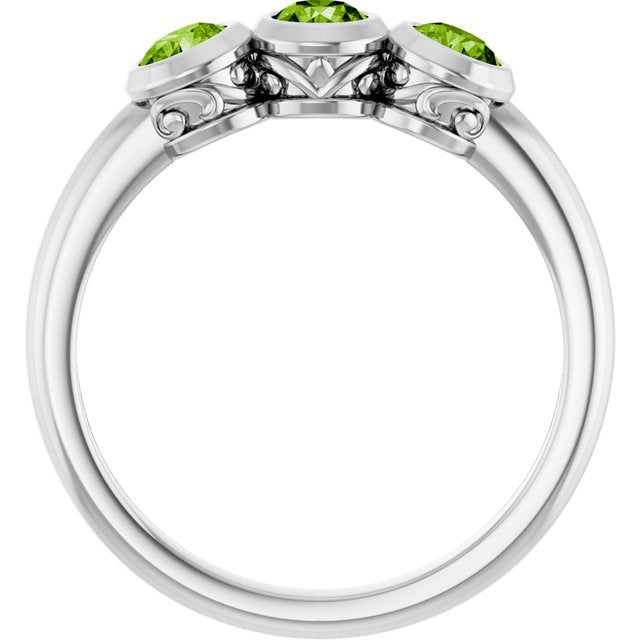 Round Peridot Three Stone Ring in White Gold
