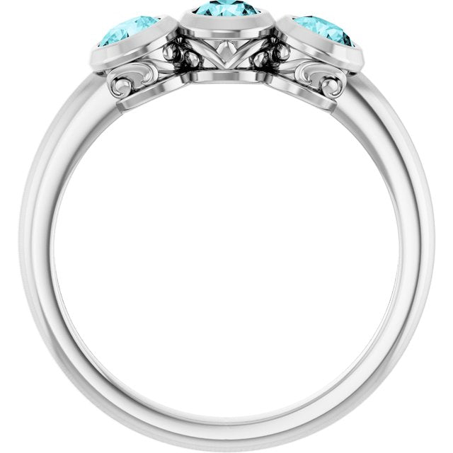 Round Blue Zircon Three Stone Ring in White Gold