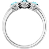 Round Blue Zircon Three Stone Ring in White Gold