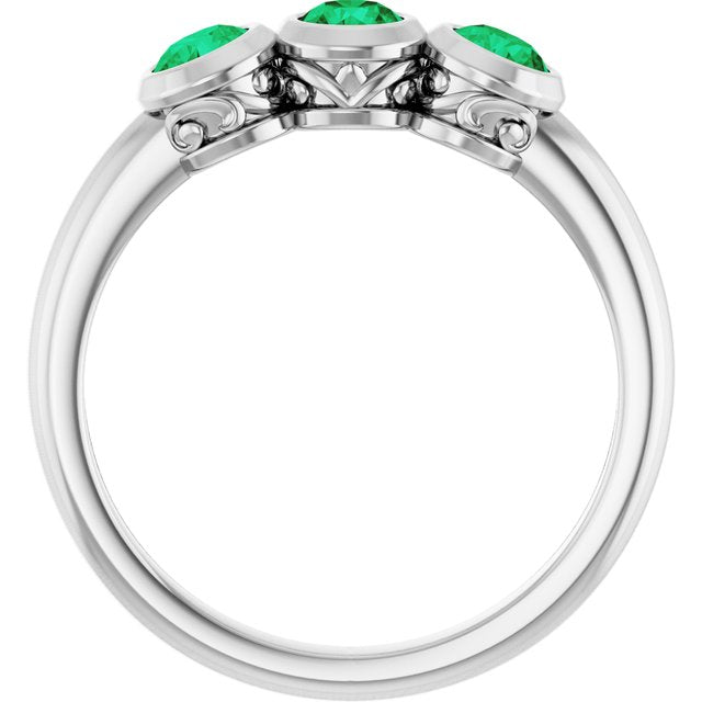 Round Lab-Grown Emerald Three Stone Ring in Platinum
