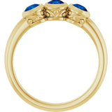 Round Lab-Grown Blue Sapphire Three Stone Ring in Yellow Gold