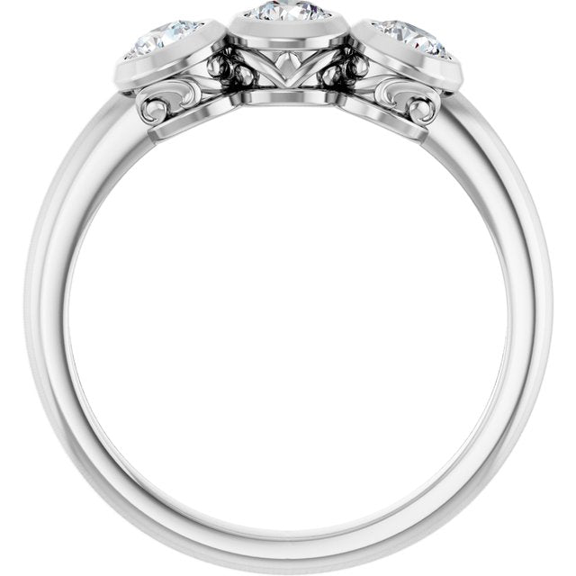 Round White Sapphire Three Stone Ring in Platinum