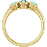 Round Blue Zircon Three Stone Ring in Yellow Gold
