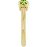Round Peridot Three Stone Ring in Yellow Gold