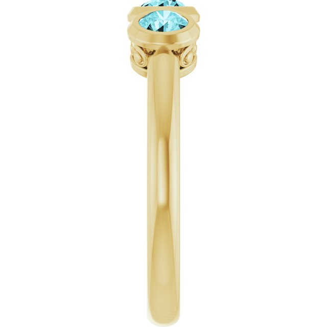 Round Blue Zircon Three Stone Ring in Yellow Gold